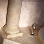 beige bathtub setting with pillar
